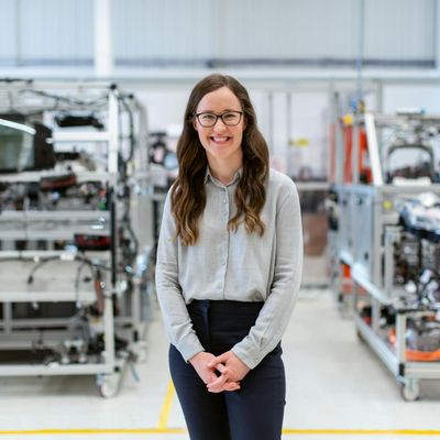 Confident female business professional in modern workplace setting